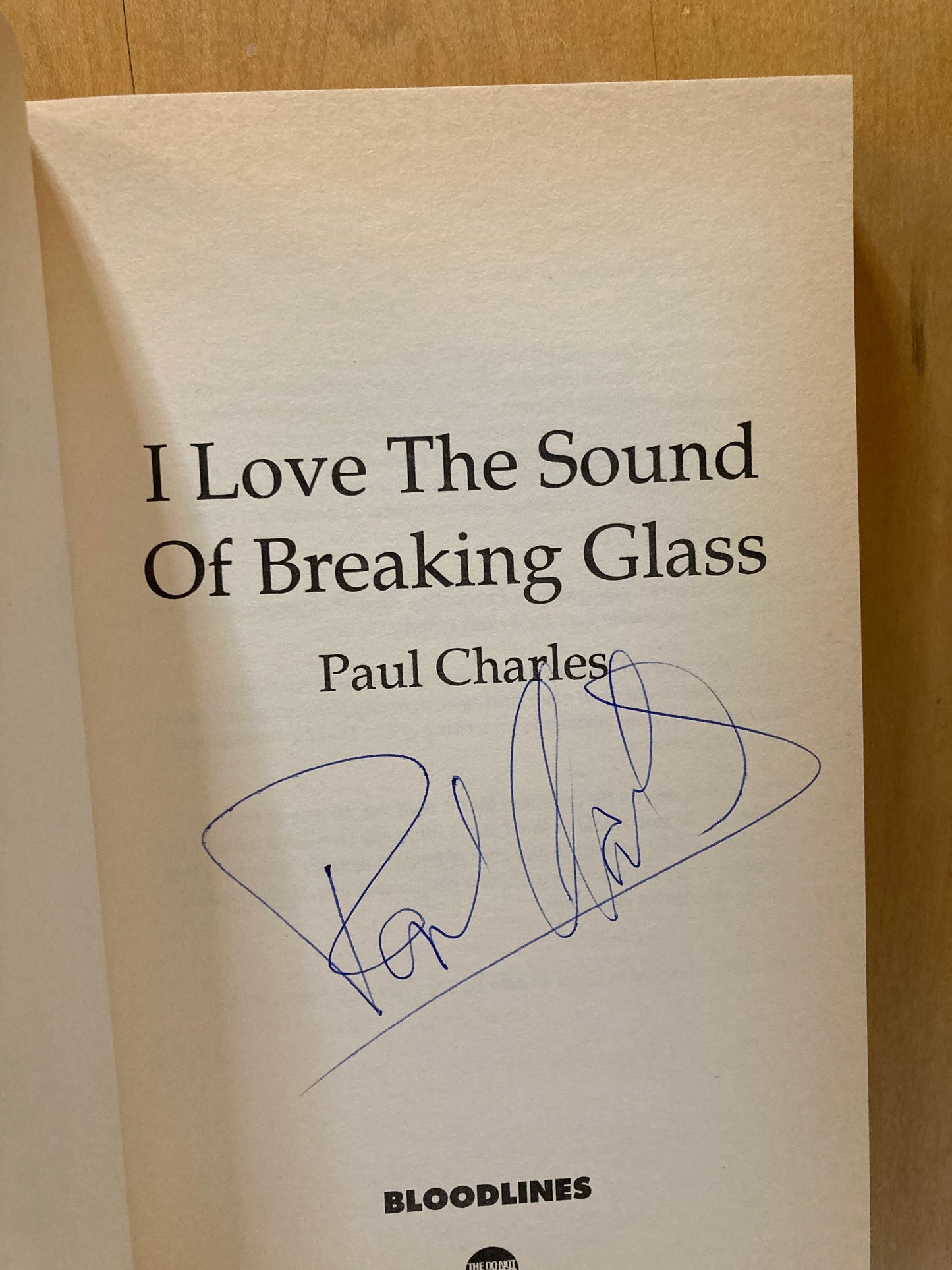 I love the sound of breaking glass (Signed)